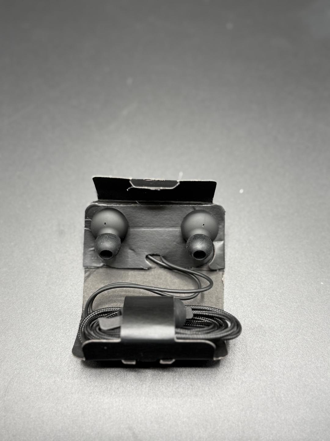 Black AKG handfree