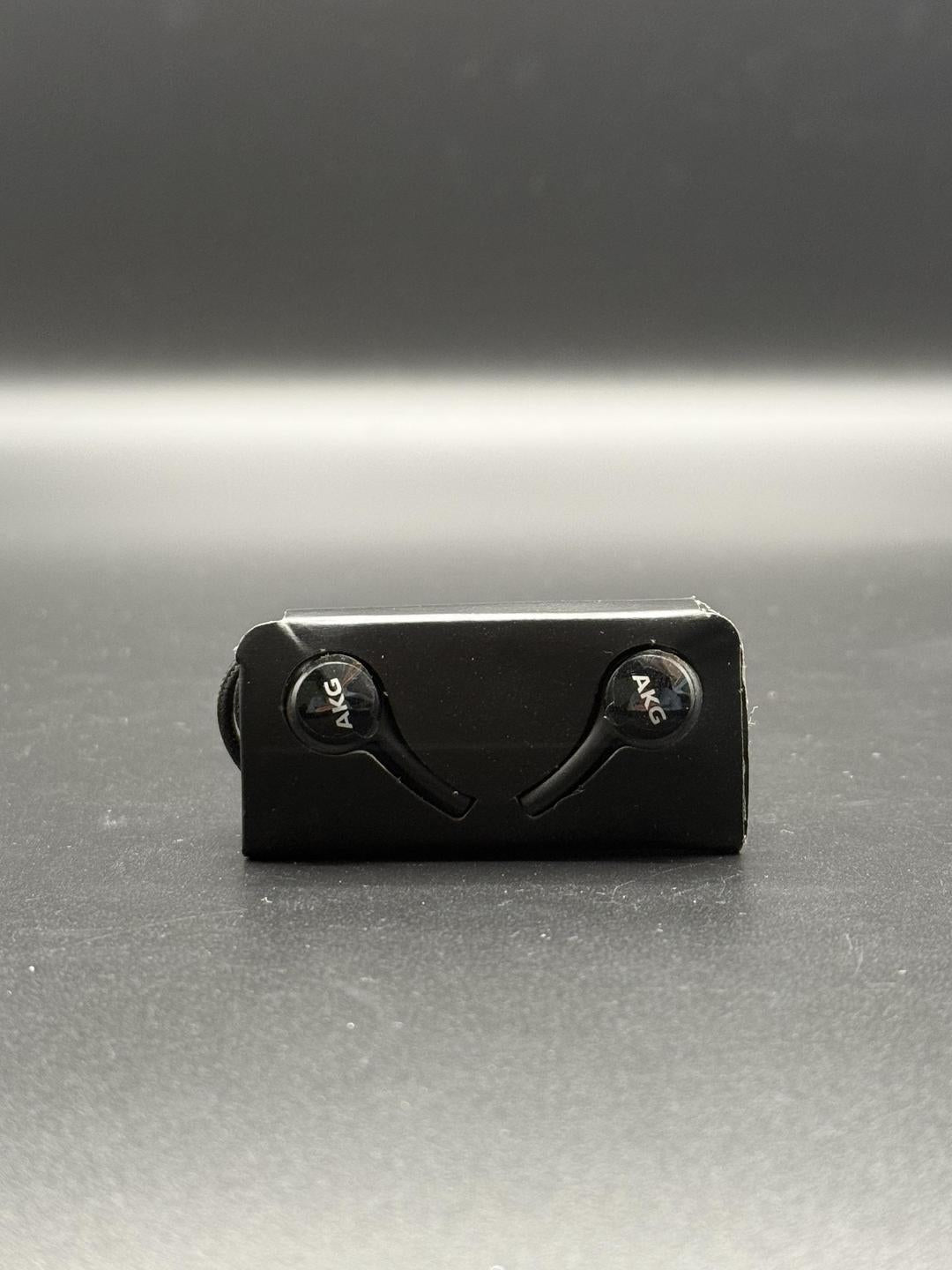 Black AKG handfree